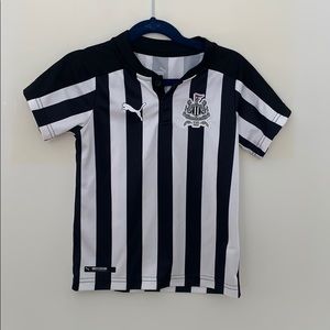 Newcastle United home jersey.